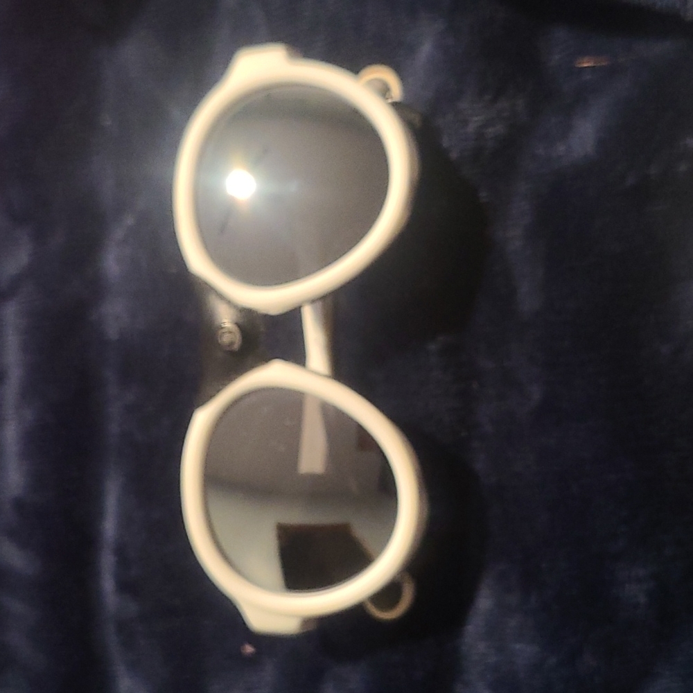 Authentic used Moncler sunglasses.